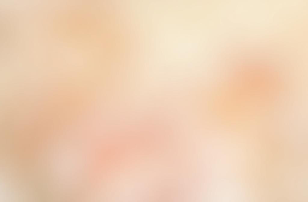 Close-up of cosmetic product with subtle floral elements, representing quality and nature.